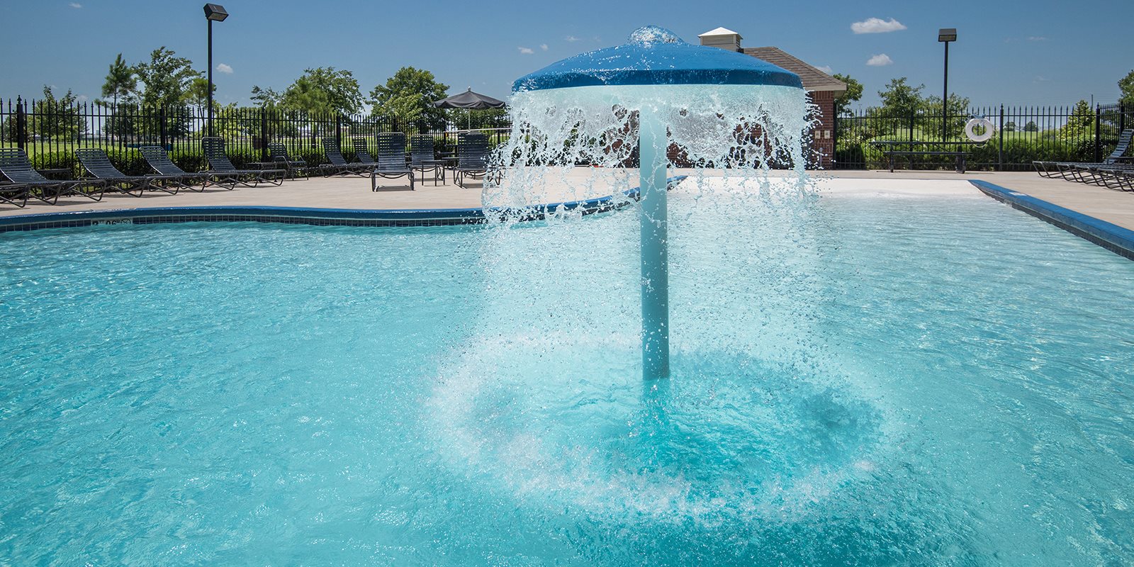 Modern Pool with Waterfall at The Greens on Aspen, Oklahoma